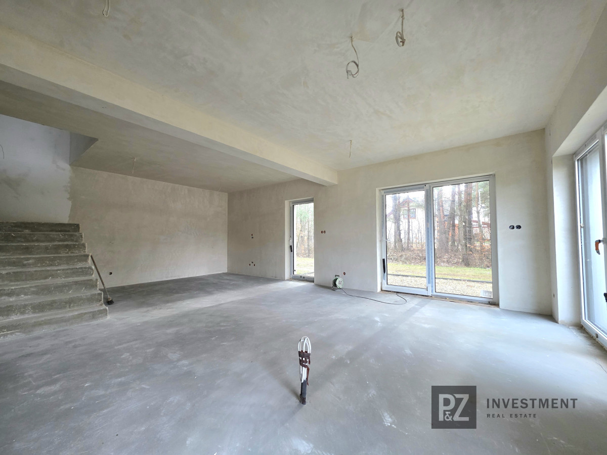 Dom w zabudowie bliźniaczej przy lesie