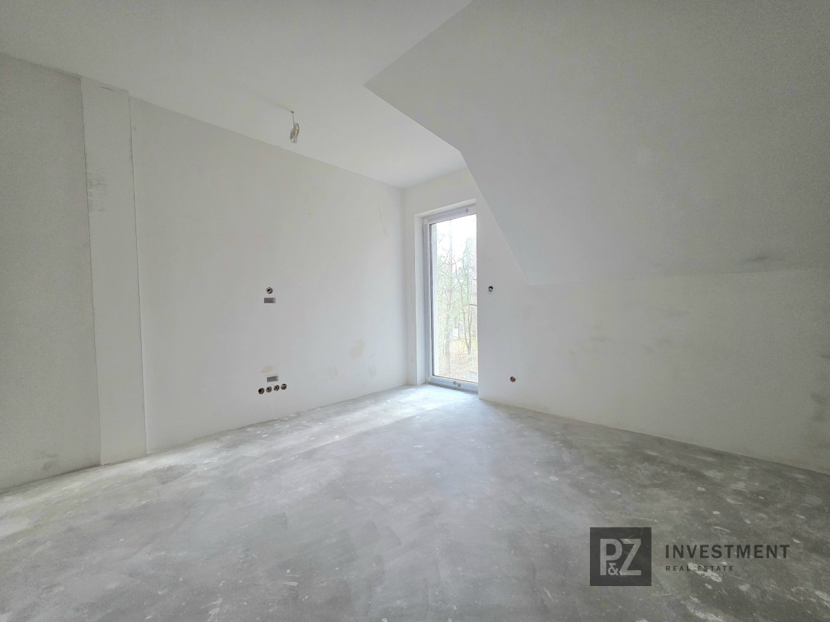 Dom w zabudowie bliźniaczej przy lesie