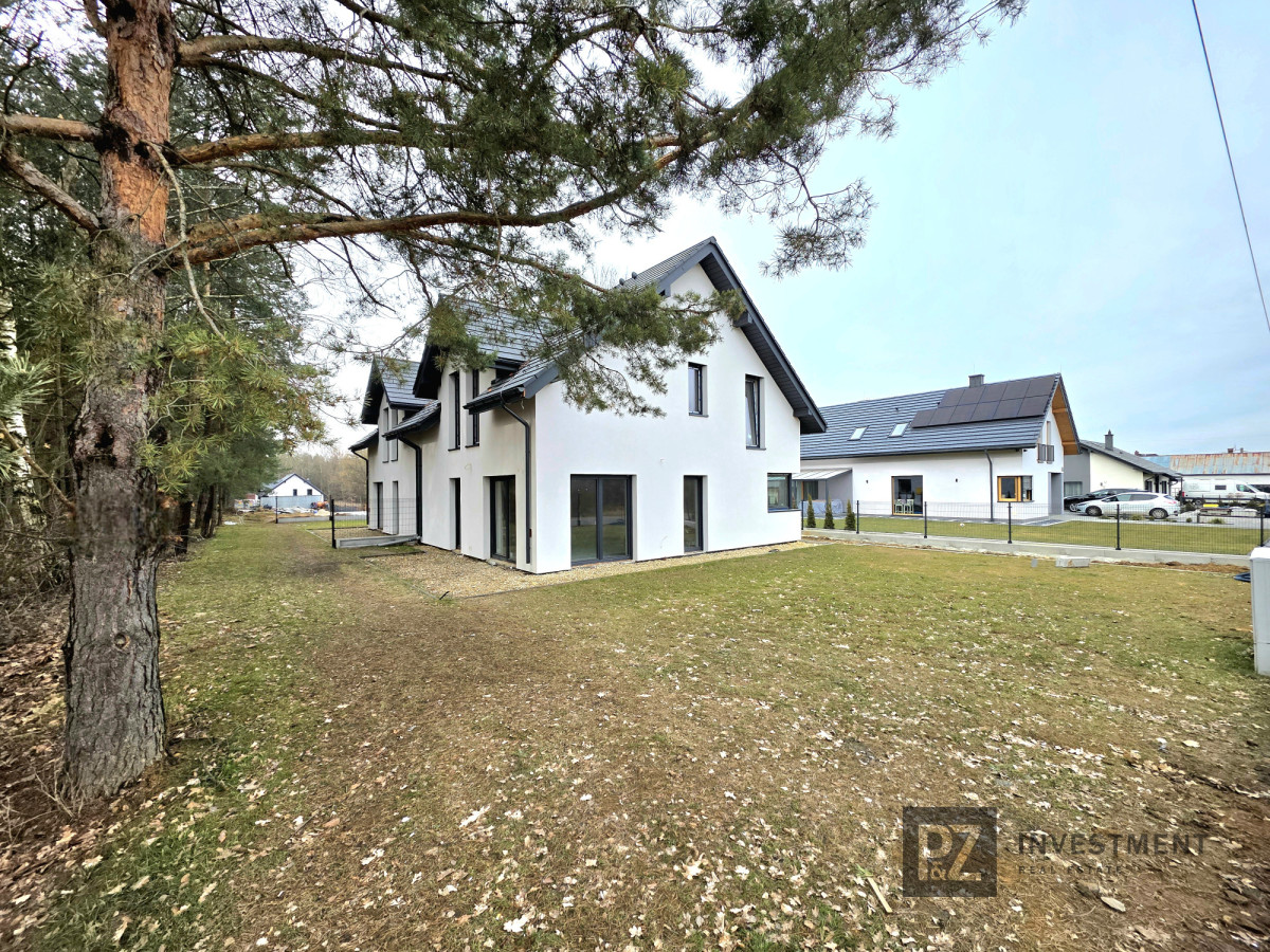 Dom w zabudowie bliźniaczej przy lesie